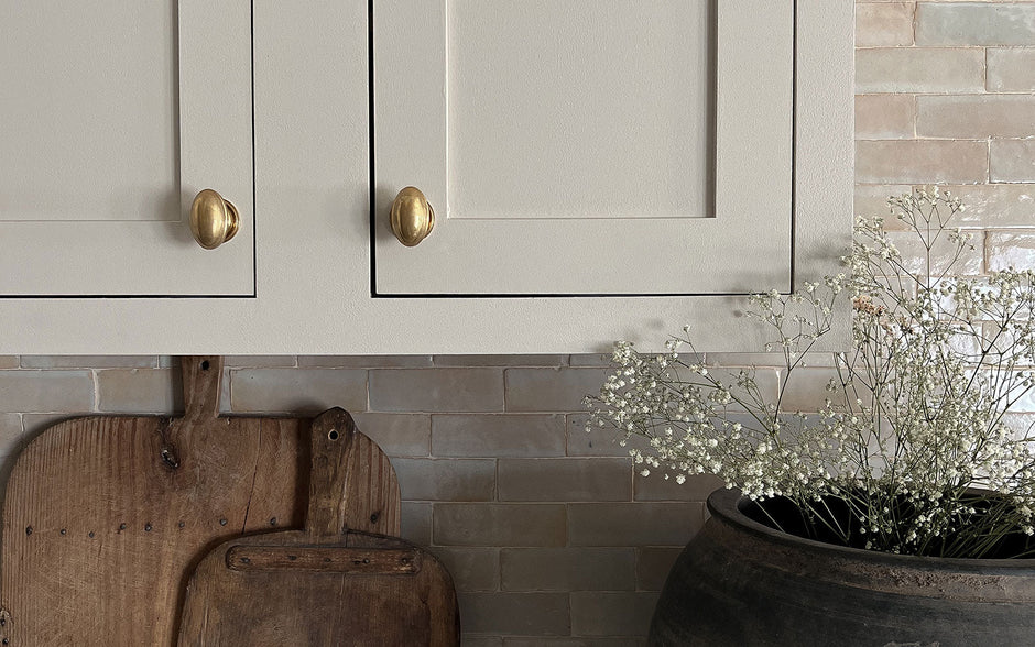 shaker beige kitchen cabinets with unlacquered brass cabinet knobs from nostalgic warehouse