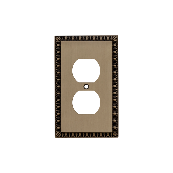 Egg & Dart Switch Plate with Outlet in Antique Brass