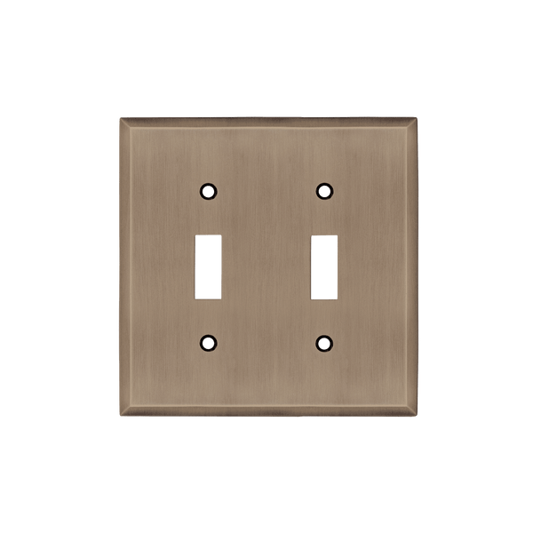 New York Switch Plate with Double Toggle in Antique Brass
